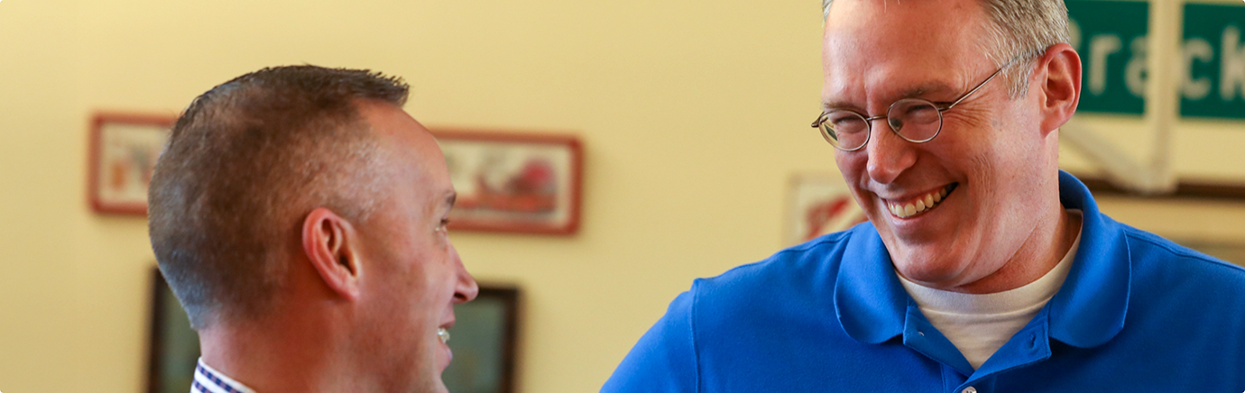 Close up of orthodontist in Rockwall talking to patient